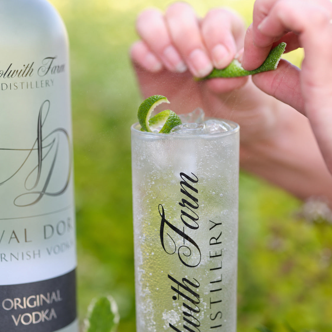 A twist of fresh lime over an Aval Dor vodka lime soda
